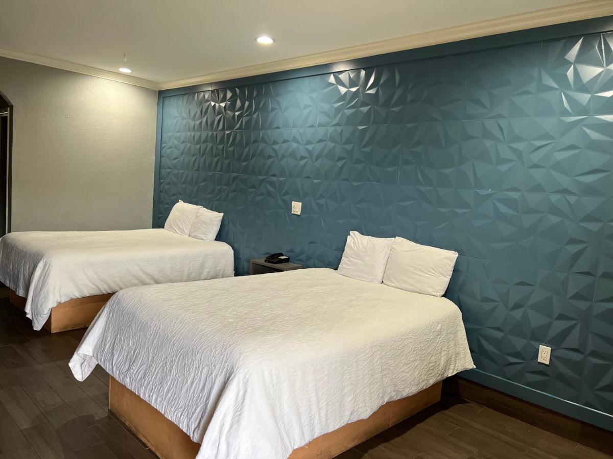 هيوستن The Symphony Inn & Suites المظهر الخارجي الصورة